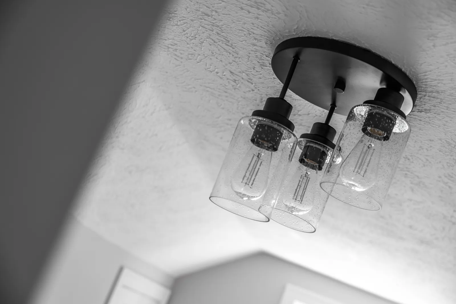 Glass shade ceiling fixture closeup